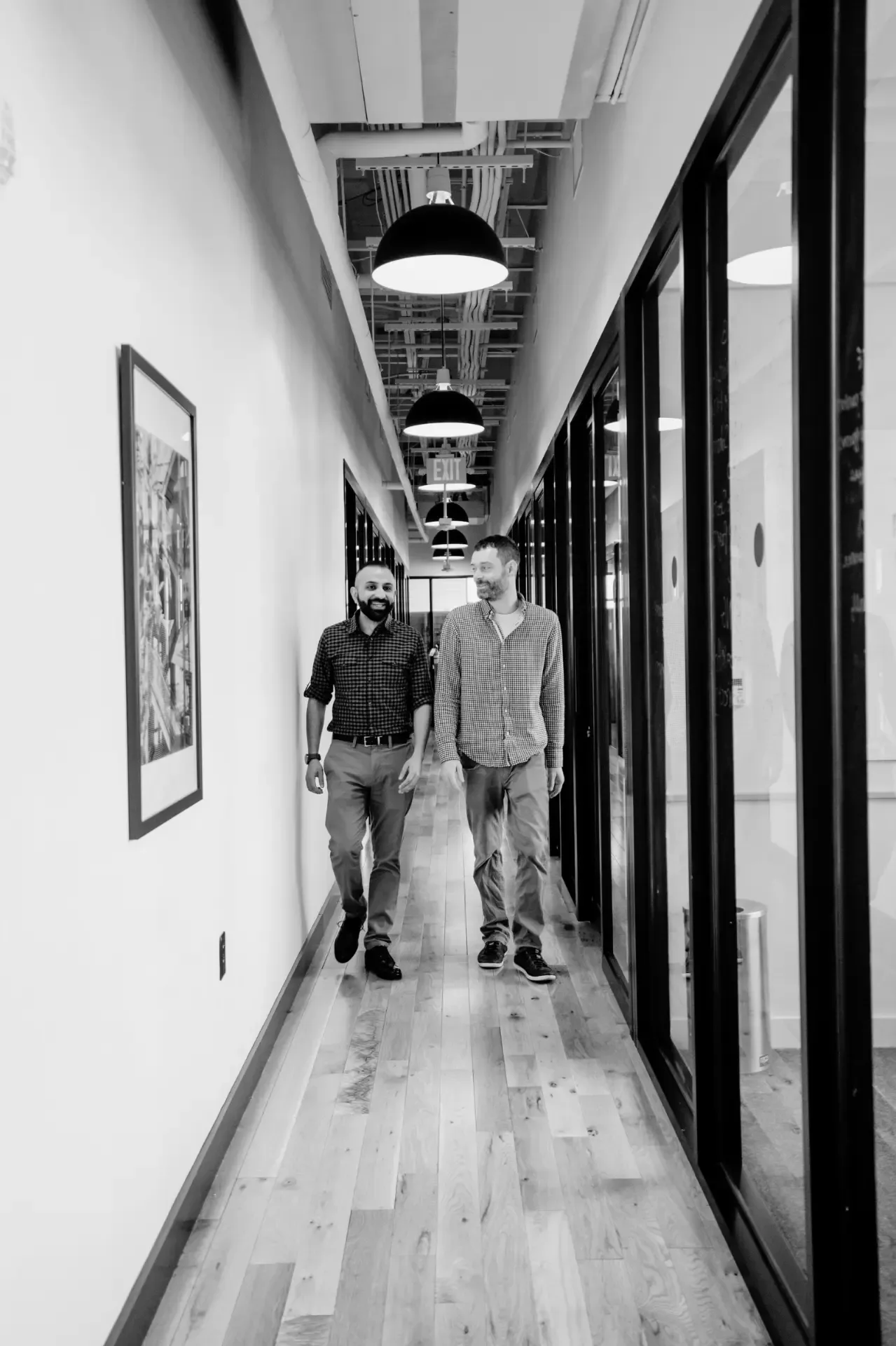 Two Webconsuls partners walking through the office